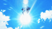 a blue sky with white clouds and the sun shining through the clouds
