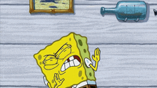 a cartoon drawing of spongebob with a bottle and anchor in the background