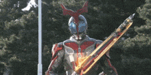 a man in a superhero costume holding a sword