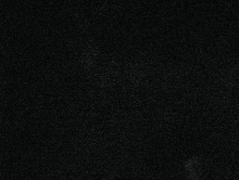 a full moon is shining brightly in the dark