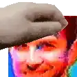 a hand is holding a hat over a man 's head .