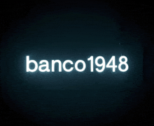 a neon sign that says banco 1948 on it