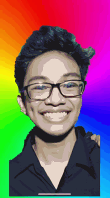 a man with glasses is smiling in front of a colorful background