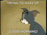 a cartoon of tom trying to wake up and saying `` good morning '' .