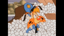 a cartoon dog in a police uniform is surrounded by eggs .