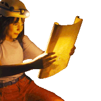 a woman wearing a hard hat is holding a large piece of paper