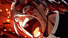 a close up of a person 's face with blood on it