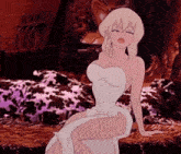 a cartoon woman in a white dress is sitting on a bed .