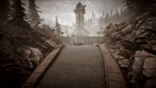 a brick walkway leads to a tower with a cross on top