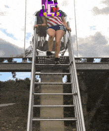 a woman is going down a slide with a pixelated face on her head
