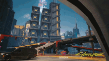 huge building stadia cyberpunk2077 giant building in awe of the city