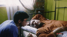 a man is laying in a hospital bed and the word full is on the bottom
