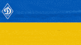 a blue and yellow flag with the letter d in the middle