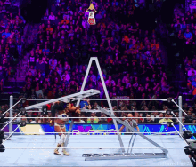 a woman in a wrestling ring with a ladder in the middle of it