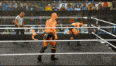 two wrestlers in a ring with nxt live on the bottom
