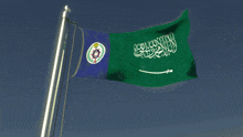 a blue flag and a green flag with arabic writing on them