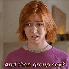 a woman with red hair and a purple shirt says " and then group sex "