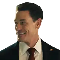 a man wearing a suit and tie with an american flag pin