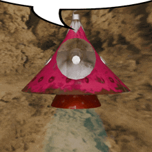 a pink object with a speech bubble in the background