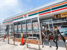 a convenience store with a sign that says ' 7 eleven ' on it