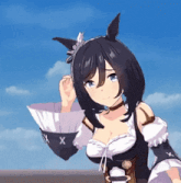 a girl in a black and white dress with the letter x on the arm