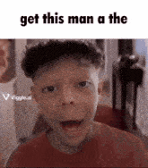 a kid is making a funny face with the words get this man a the on the bottom