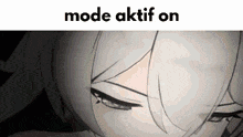 a close up of a person 's face with the words mode aktif on