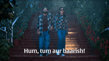 a man and a woman are walking down a set of stairs with hum tum aur baarish written on the bottom