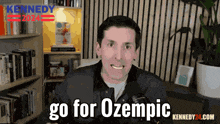 a man says go for ozempic in front of a book shelf