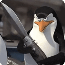 a penguin is holding a knife in its hand
