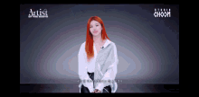 a woman with red hair is on a screen with the words artist of the month