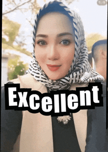a woman with a scarf around her head has the word excellent above her head