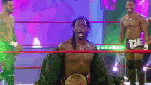 a man in a wrestling ring is wearing a belt that says intercontinental heavyweight champion