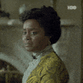 a close up of a woman 's face with the word hbo on the bottom