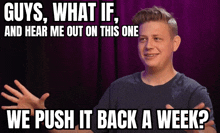 a man in a purple shirt says " guys what if and hear me out on this one we push it back a week ? "