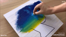 a person is painting a picture with the words wow art on the bottom right