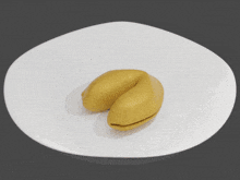 a fortune cookie with a picture of a woman on it is open
