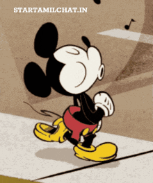 a cartoon of mickey mouse walking down a sidewalk with the words starttamilchat.in below him