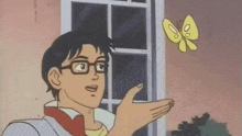 a man with glasses is pointing at a butterfly that is flying in front of him .