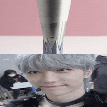 a close up of a person 's face next to a close up of a tool