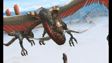 a dragon with red wings and horns is flying through the air