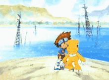a boy in a blue shirt with a star on it is holding a yellow dinosaur