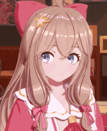 a close up of a girl with a star on her hair