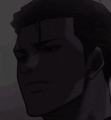a close up of a man 's face with a serious look