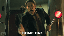 a man in a suit and tie is screaming with the words come on behind him