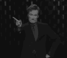 Conan O'Brien Shaking His Finger GIF - Conan O Brien No Oh No GIFs