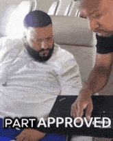 two men are looking at a laptop with the words part approved written on the bottom