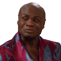 a bald man wearing a purple and blue robe is making a funny face