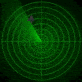 a green radar screen with a cartoon character in the middle
