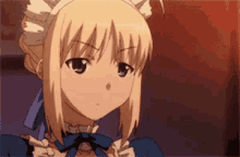 a blonde anime girl wearing a cat ears headband and a blue dress is looking at the camera .